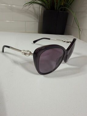 Chanel Authentic Purple Sunglasses . Pearl accents. Excellent condition .